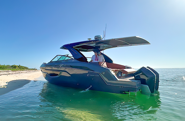 The Rodriguez Family on their Cruisers Yachts boat in the water