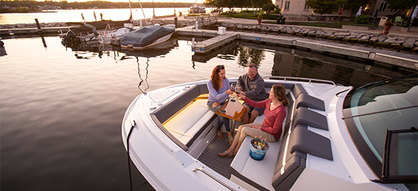 group of people on the bow of a cruisers yachts boat