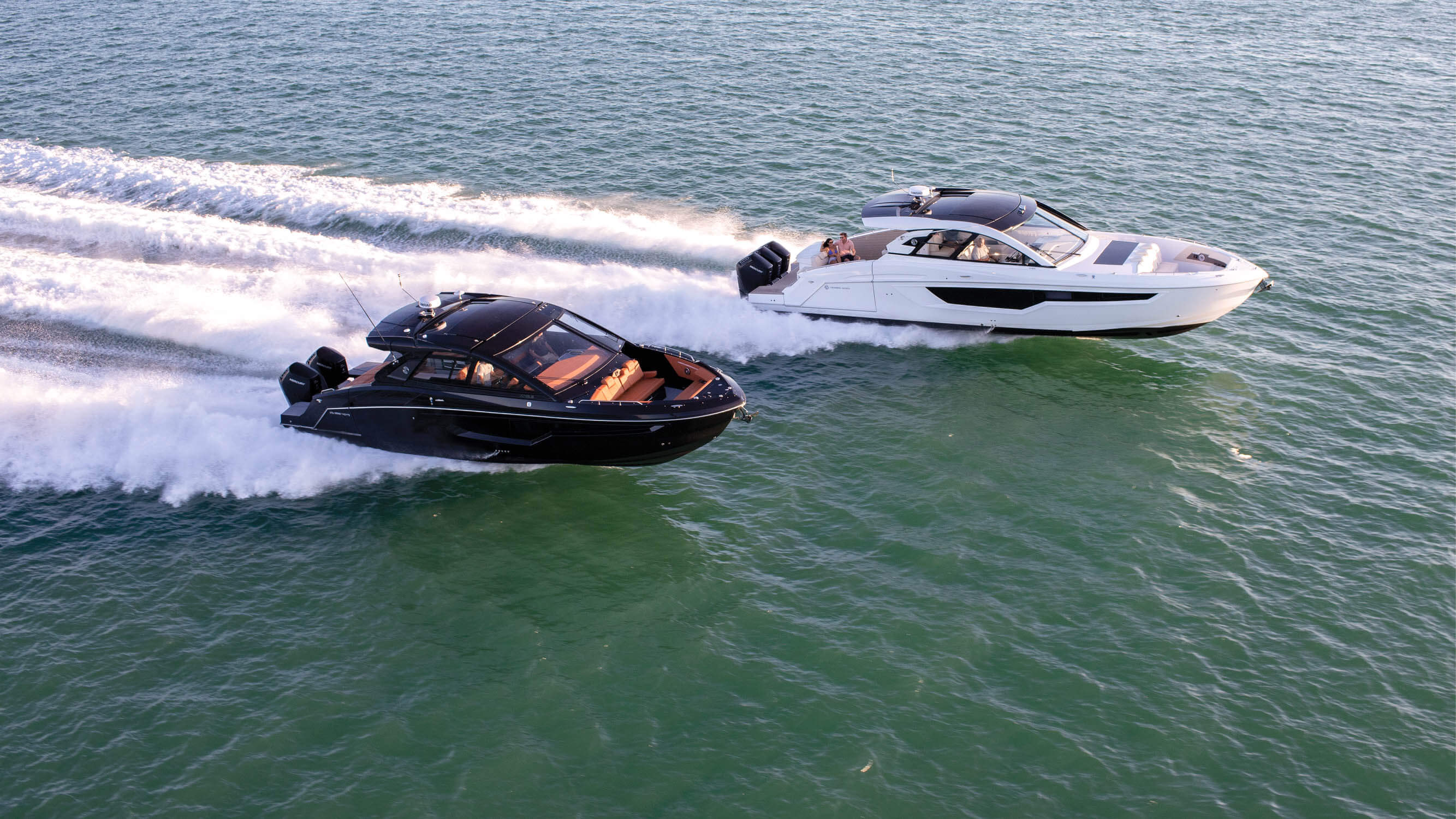 Two Cruisers Yachts GLS boats on water