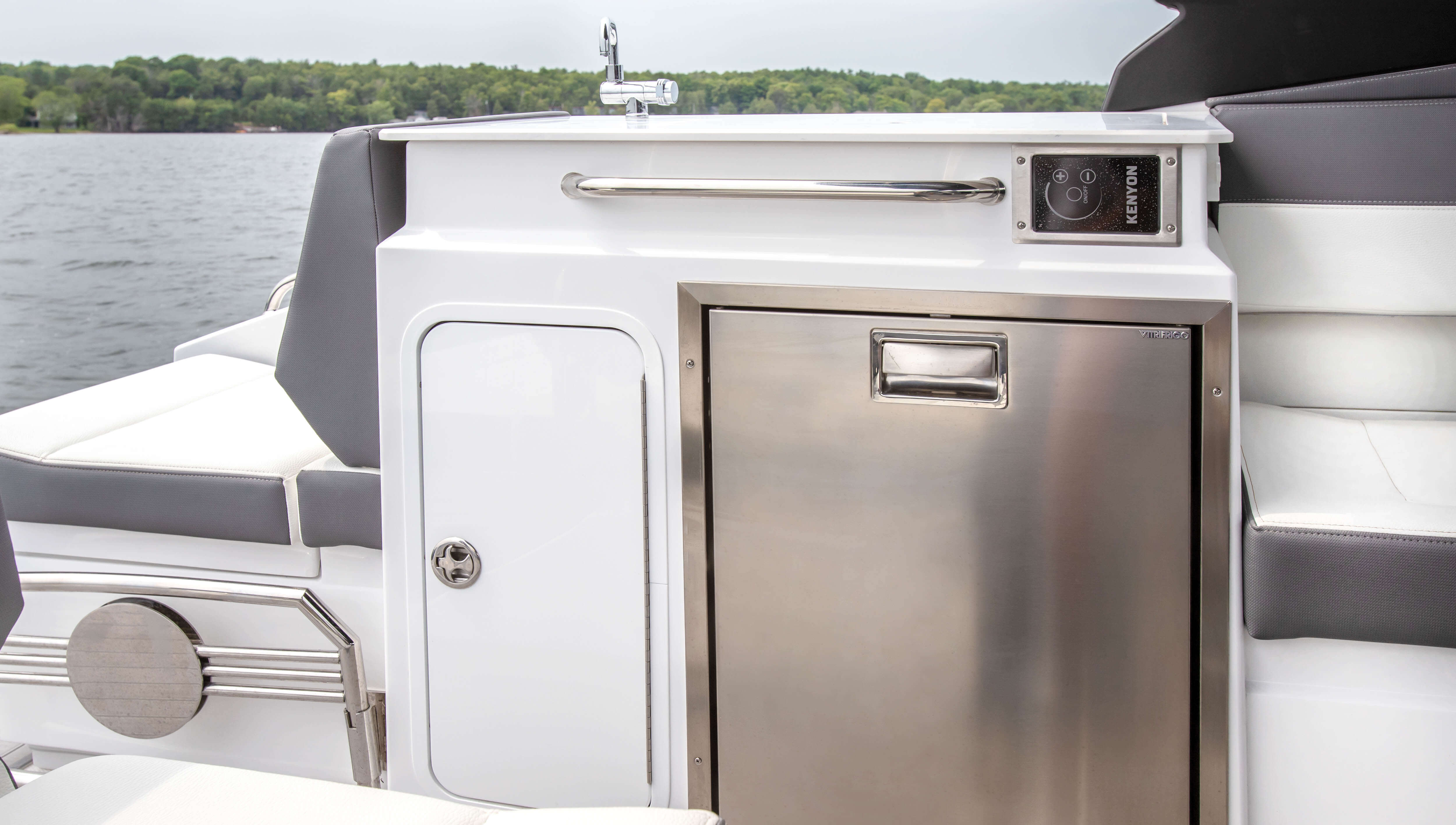 Cockpit galley fridge and storage on the 34 GLS I/O
