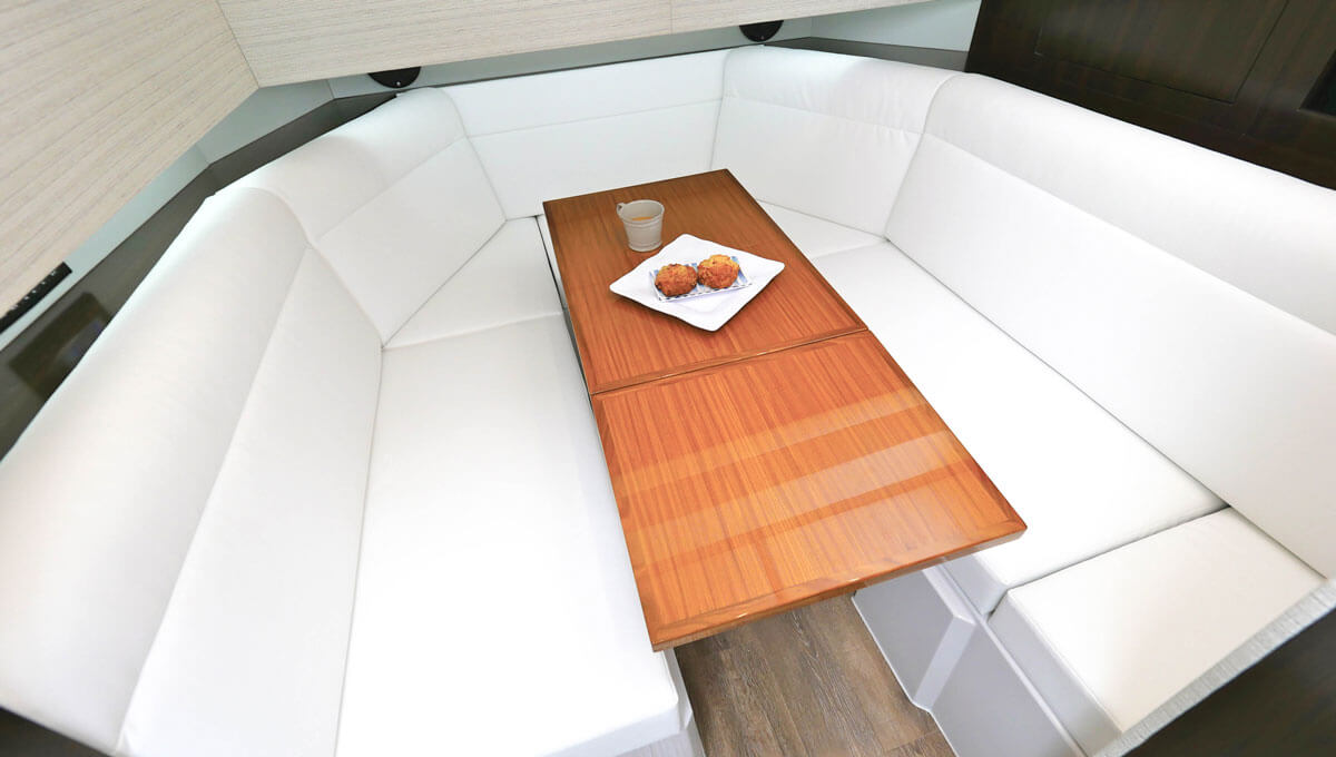 Cruisers Yachts 42 GLS IO lower salon seating and table