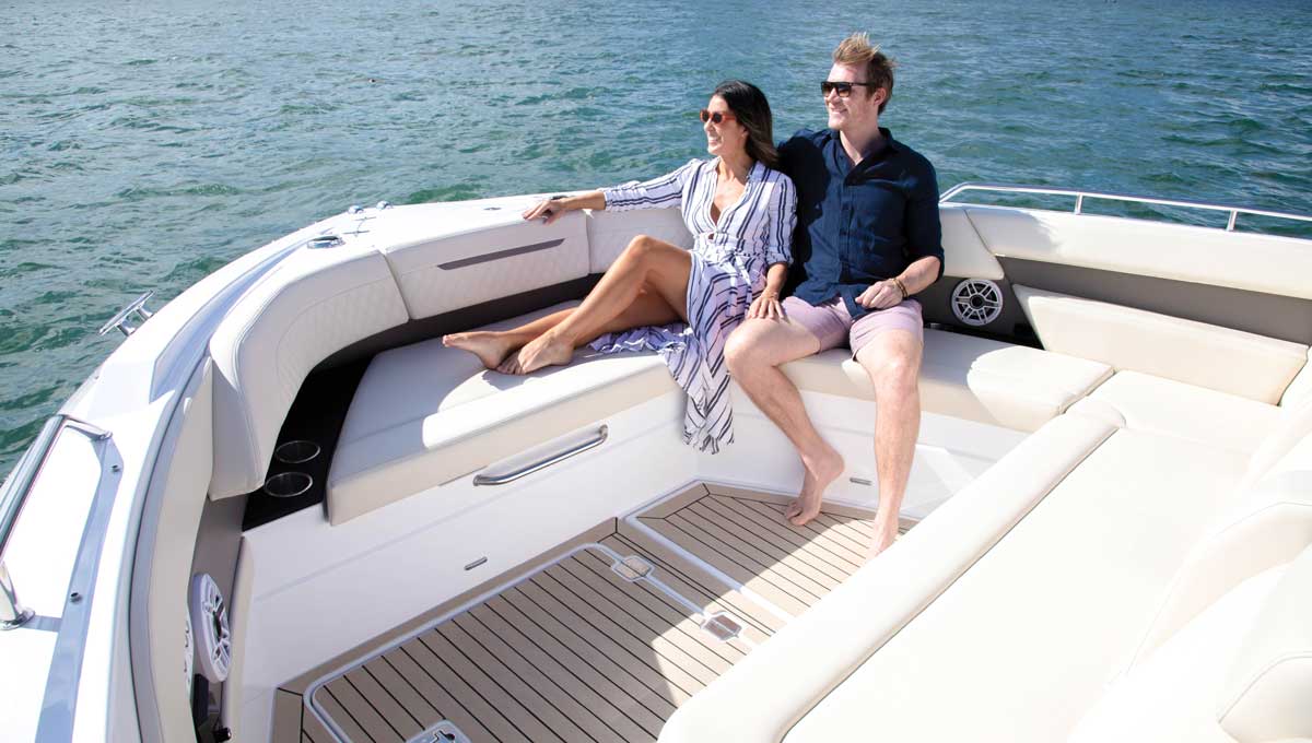 Couple sitting on 50 GLS bow seating