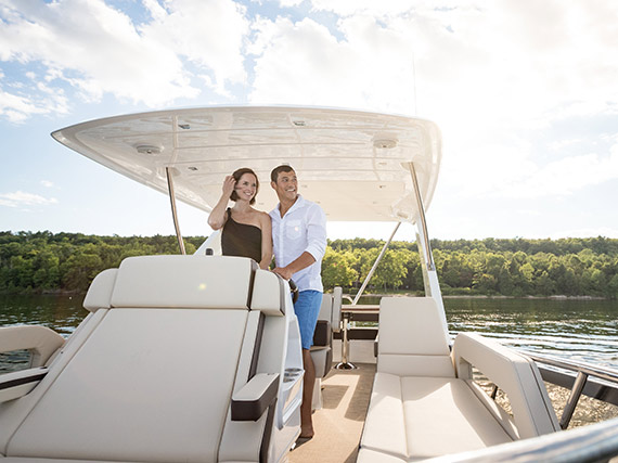 Couple on a 60 Cruisers Yachts 60 Fly