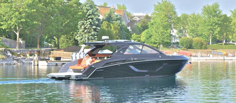 Cruisers Yachts 42 GLS I/O in black on the water