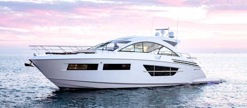 Cruisers Yachts 60 Cantius on the water at sunset