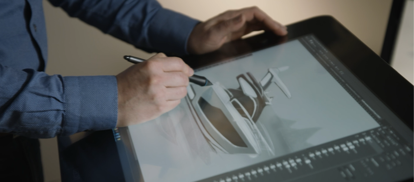 A graphic designer sketching out the 57 FLY