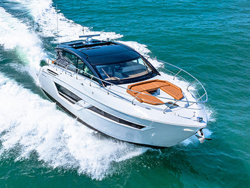 Cantius series motoryacht near a waterfront property